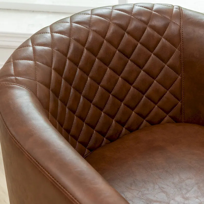 Gepolsterter Clubsessel aus Leder im Fassondesign mit Ziernägeln
